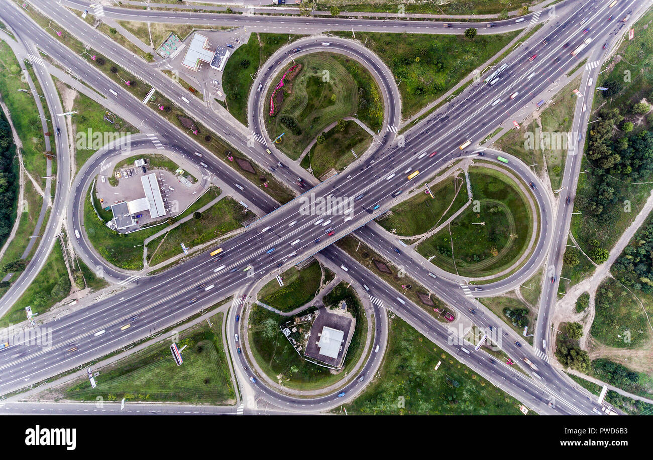 Static vertical top down aerial view of traffic on freeway interchange ...