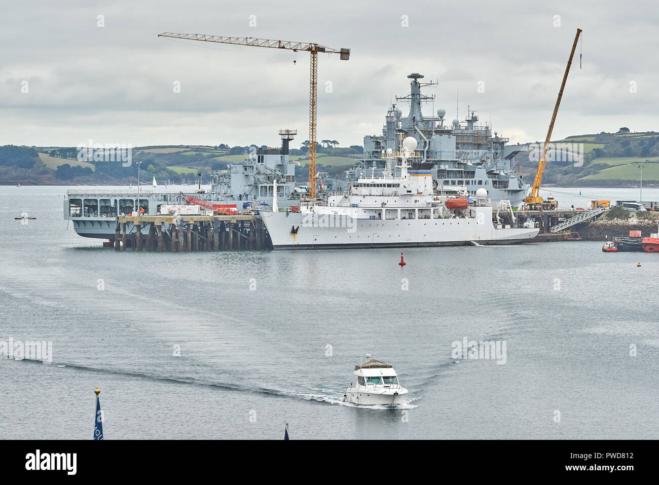 USNS Bruce C Heezen (Pathfinder class oceanographic survey ship), moored in front of RFA Tideforce, a Royal Navy tanker (moored for installation work) Stock Photo