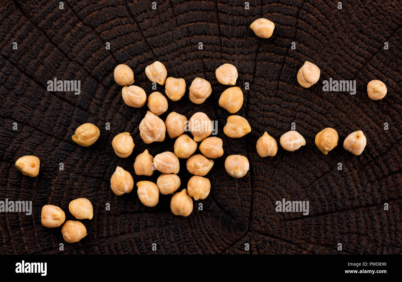 Chickpeas on black wooden background. Top view Stock Photo