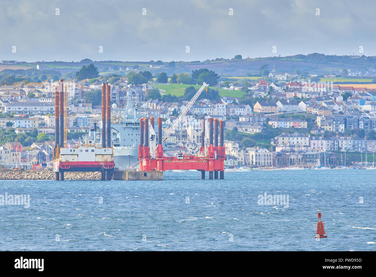 View of Falmouth, Cornwall, England, with its homes, port and harbor, as seen from the Roseland peninsula Stock Photo