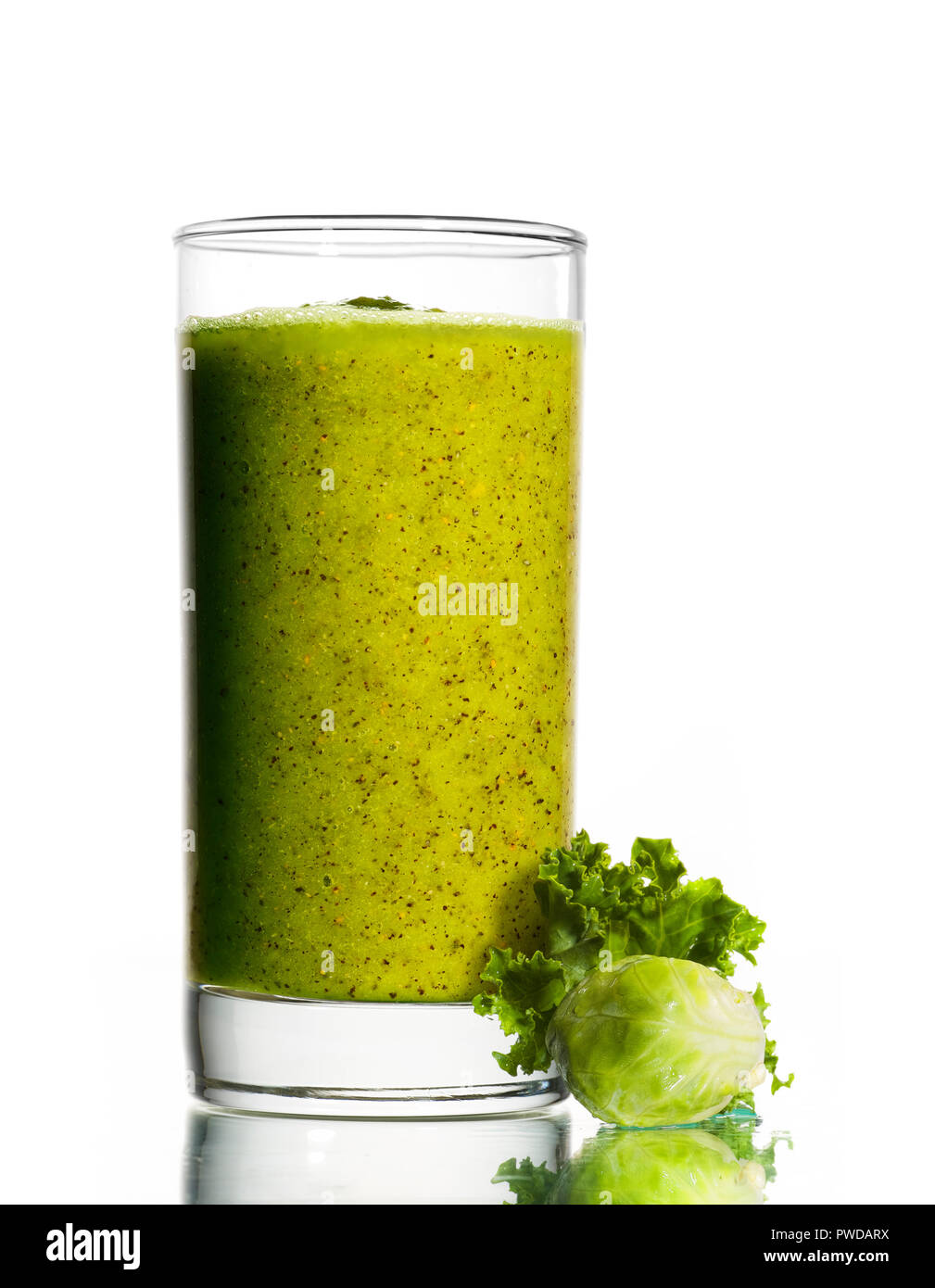 Glass of Green Healthy Drink Smoothie, Detox Juice, Kiwi Kale, Brussel Sprouts Stock Photo