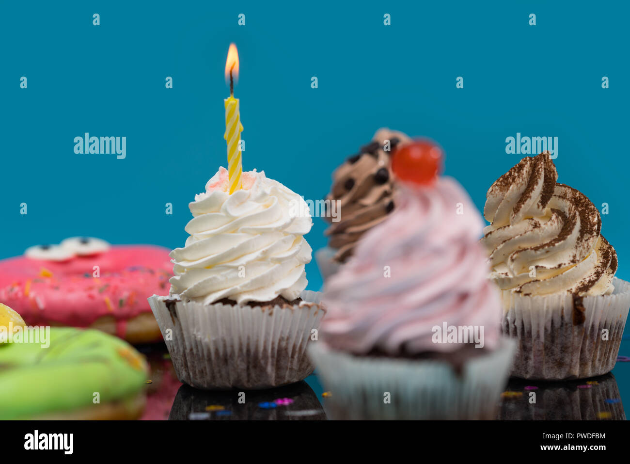 Colorful delicious sweet donuts spinning hi-res stock photography and ...