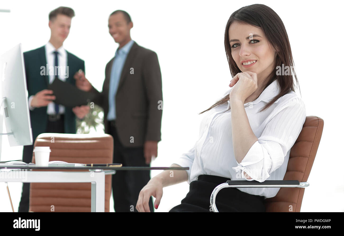 successful business woman sitting at Desk in her office Stock Photo - Alamy