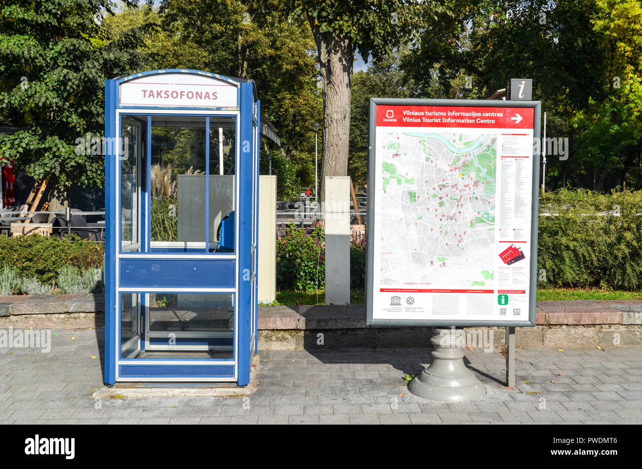 Tourist map and telephone booth in Vilnius, Lithuania Stock Photo