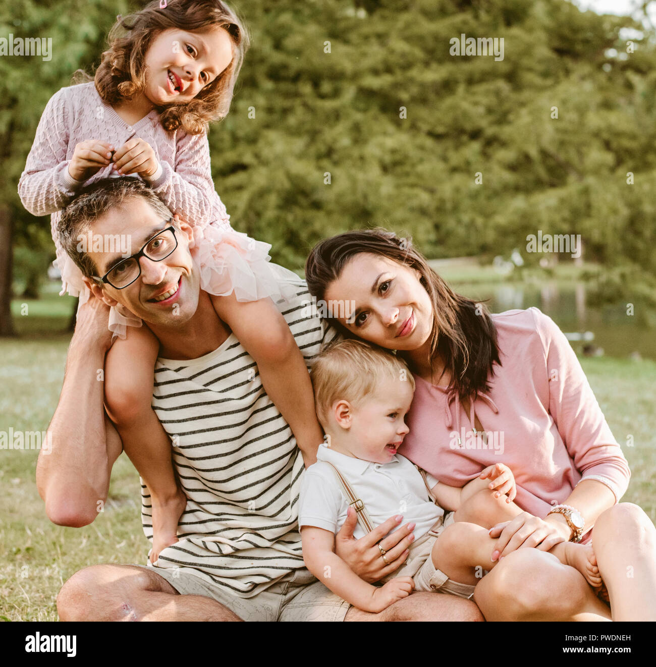 Family in beautiful summer meadow hi-res stock photography and images ...