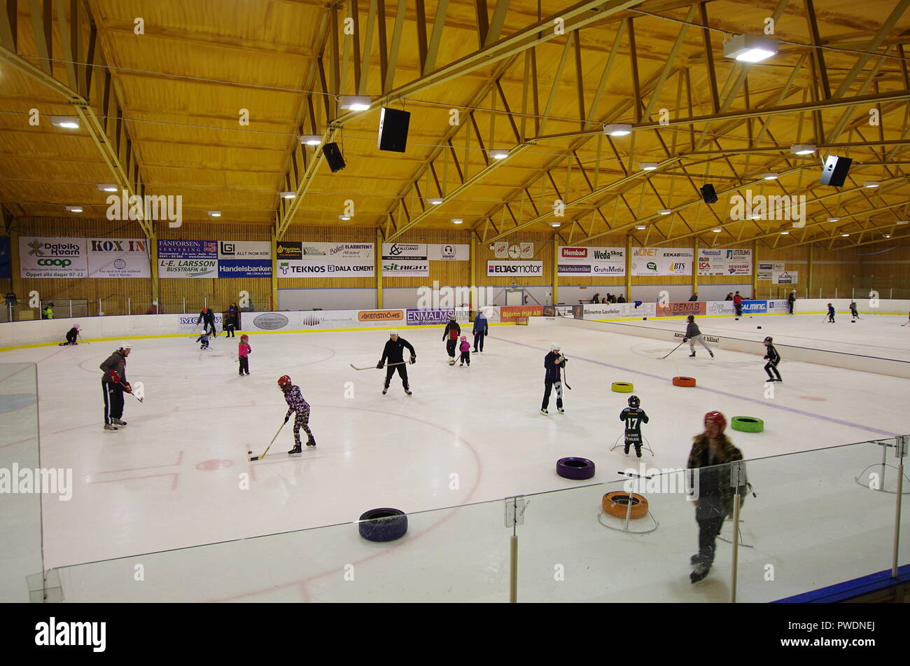 Ice Hockey training with children in a Hockey Arena in a small town of