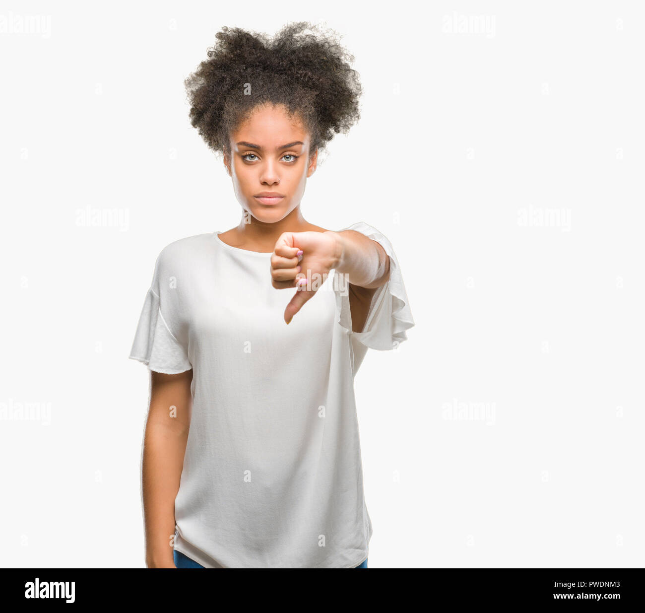 Young afro american woman over isolated background looking unhappy and ...