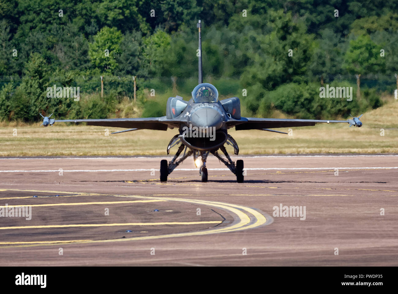 Lockheed Martin F-16C combat jet from the Hellenic Air Force (Greece) Zeus Demonstration Team arrives at RAF Fairford to participate in the the RIAT Stock Photo