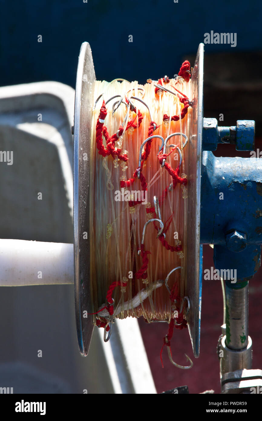 reel fishing with hooks and lures Stock Photo Alamy
