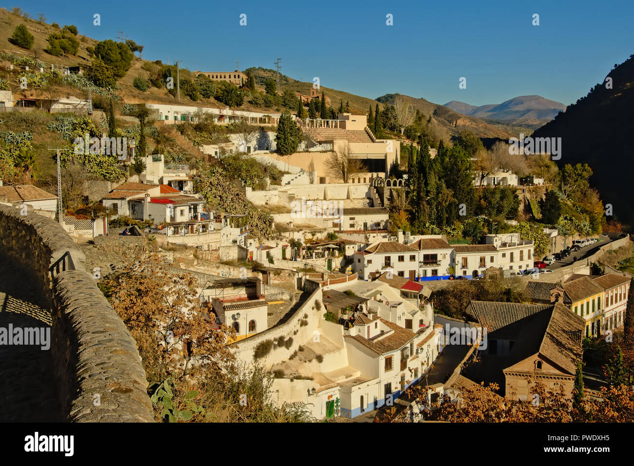 White houses on the hill slopes of Albayzin neighbourhood, Granada, aerial view Stock Photo