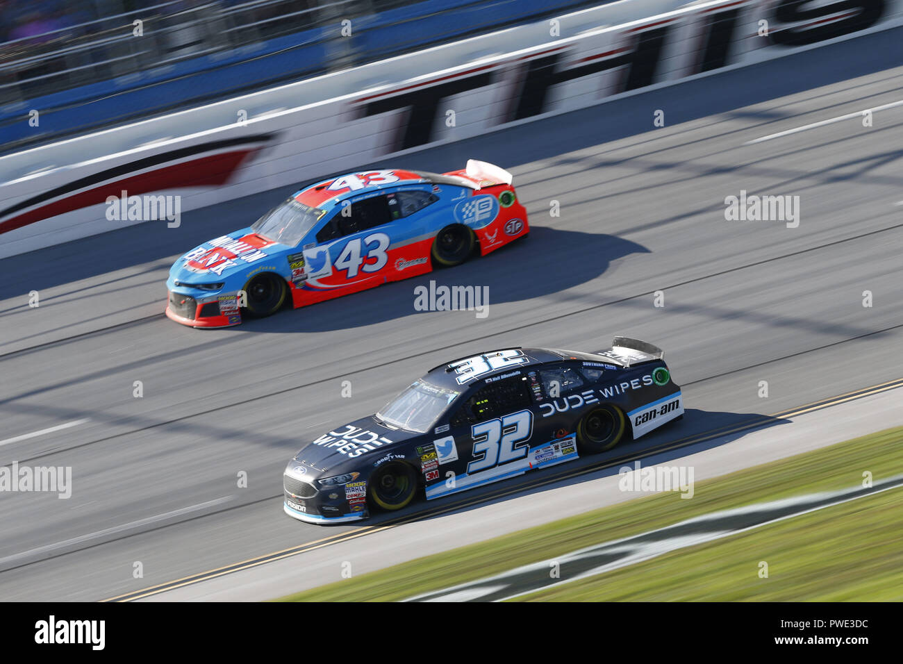 Talladega, Alabama, USA. 14th Oct, 2018. Matt DiBenedetto (32) battles ...