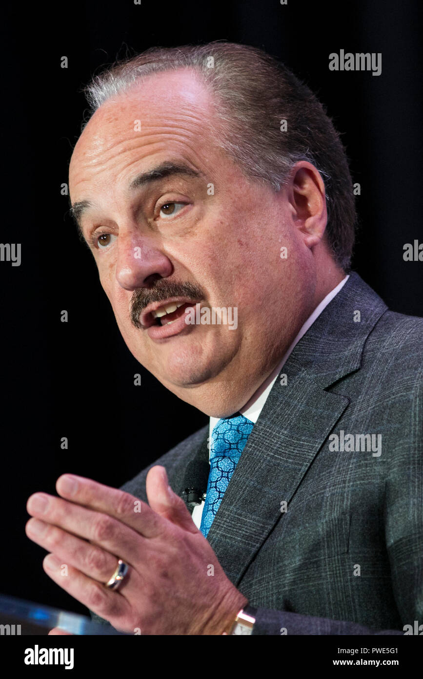 Washington DC, USA. 15th Oct 2018. Larry Merlo, President and CEO of CVS Health, participates in an interview during an Economic Club of Washington event in Washington, D.C., on October 15, 2018. Credit: Kristoffer Tripplaar/Alamy Live News Stock Photo