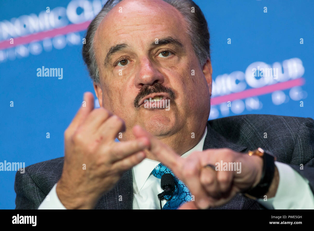 Washington DC, USA. 15th Oct 2018. Larry Merlo, President and CEO of CVS Health, participates in an interview during an Economic Club of Washington event in Washington, D.C., on October 15, 2018. Credit: Kristoffer Tripplaar/Alamy Live News Stock Photo