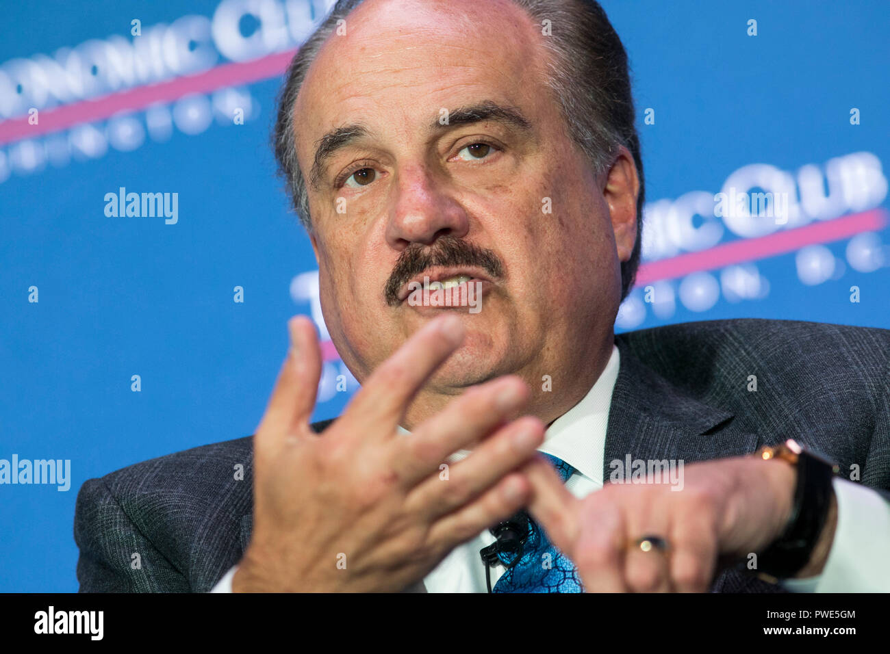 Washington DC, USA. 15th Oct 2018. Larry Merlo, President and CEO of CVS Health, participates in an interview during an Economic Club of Washington event in Washington, D.C., on October 15, 2018. Credit: Kristoffer Tripplaar/Alamy Live News Stock Photo