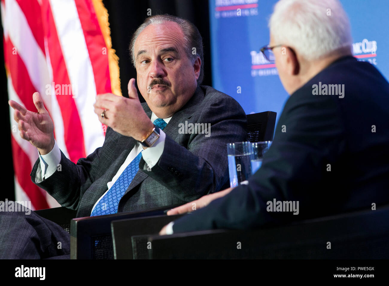 Washington DC, USA. 15th Oct 2018. Larry Merlo, President and CEO of CVS Health, participates in an interview during an Economic Club of Washington event in Washington, D.C., on October 15, 2018. Credit: Kristoffer Tripplaar/Alamy Live News Stock Photo