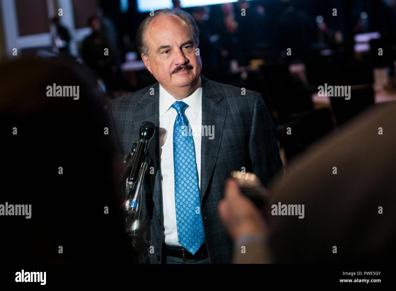 Washington DC, USA. 15th Oct 2018. Larry Merlo, President and CEO of CVS Health, participates in an interview during an Economic Club of Washington event in Washington, D.C., on October 15, 2018. Credit: Kristoffer Tripplaar/Alamy Live News Stock Photo