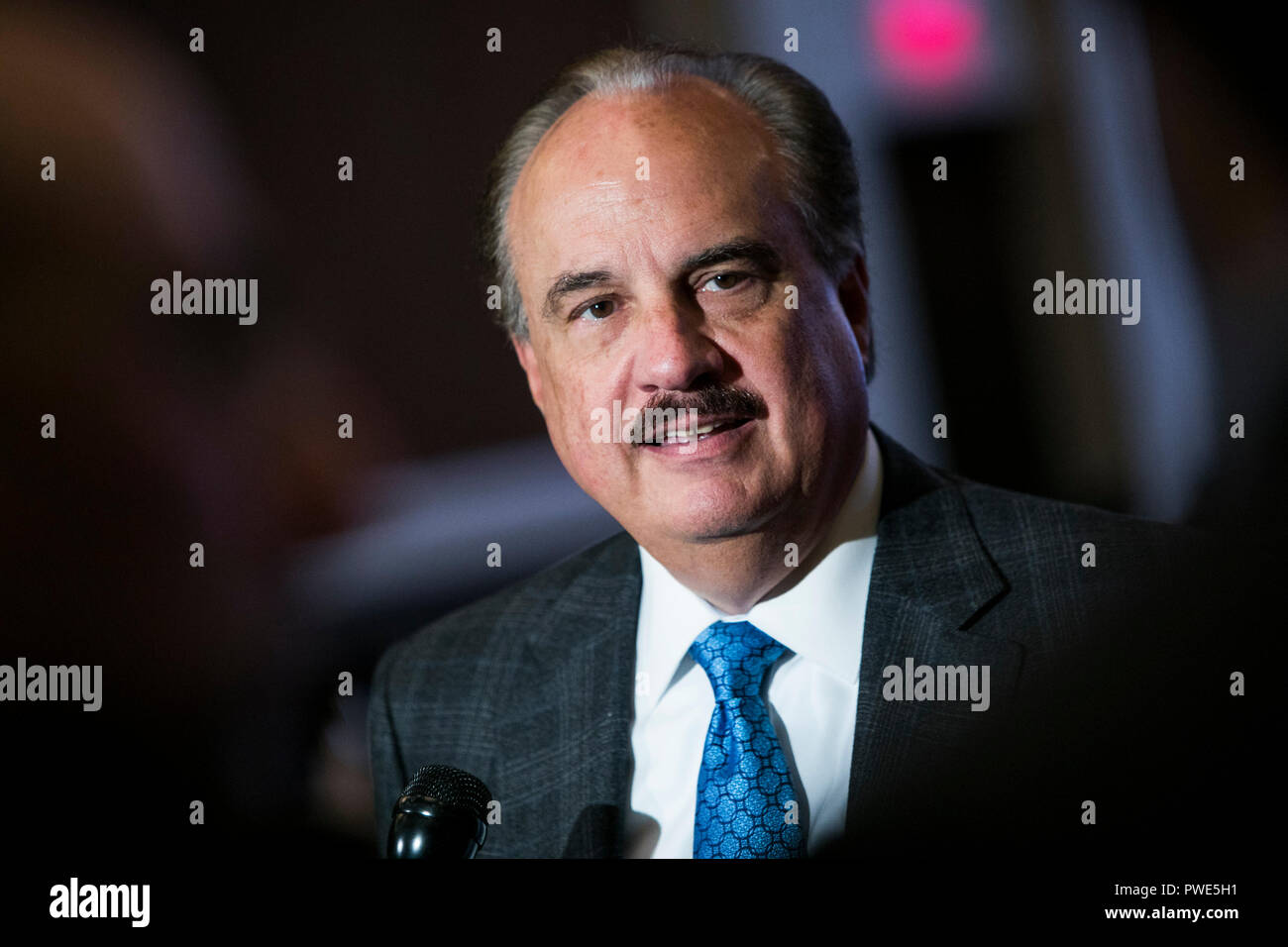 Washington DC, USA. 15th Oct 2018. Larry Merlo, President and CEO of CVS Health, participates in an interview during an Economic Club of Washington event in Washington, D.C., on October 15, 2018. Credit: Kristoffer Tripplaar/Alamy Live News Stock Photo