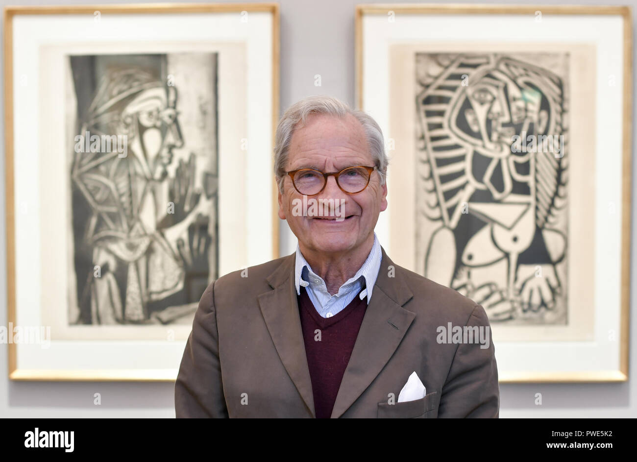 09 October 2018, Berlin: The art collector Bernd Schultz stands in front of a part of his collection in the Villa Griesebach. This is 'La femme à la fenêtre' (l) 'L'Égyptienne' by Pablo Picasso. The art dealer Bernd Schultz sells his private collection for the founding of an Exilmuseum in Berlin. (to dpa-KORR ''All my children' - art collection for NS-Exilmuseum zur Auktion' from 16.10.2018) Photo: Jens Kalaene/dpa Stock Photo