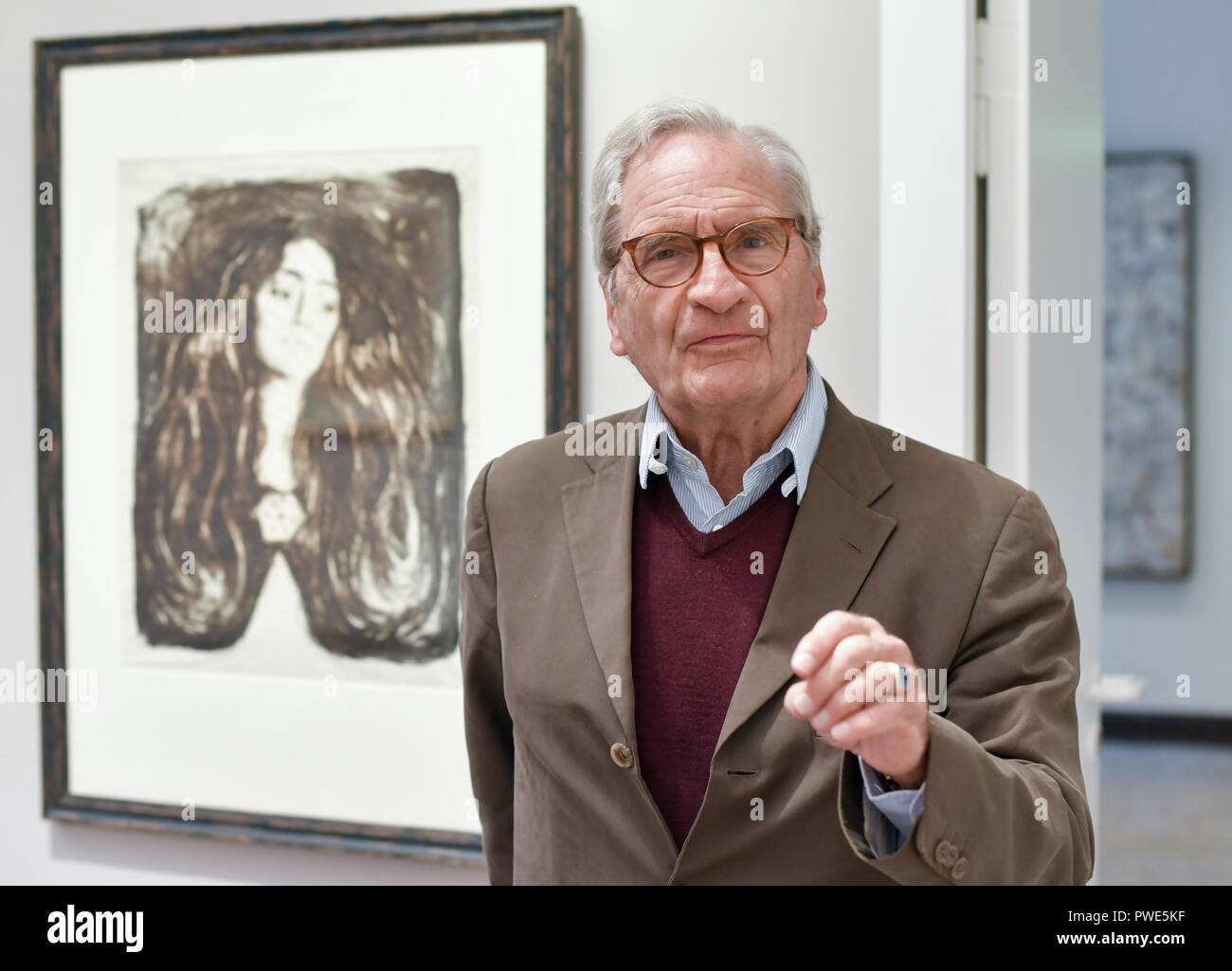09 October 2018, Berlin: 15 October 2018, Germany, Berlin: The art collector Bernd Schultz stands in front of a part of his collection in the Villa Griesebach. Here before 'The brooch. Eva Mudocci' from 1903 by Edvard Munch. The art dealer Bernd Schultz sells his private collection for the founding of an Exilmuseum in Berlin. (to dpa-KORR ''All my children' - art collection for NS-Exilmuseum zur Auktion' from 16.10.2018) Photo: Jens Kalaene/dpa Stock Photo
