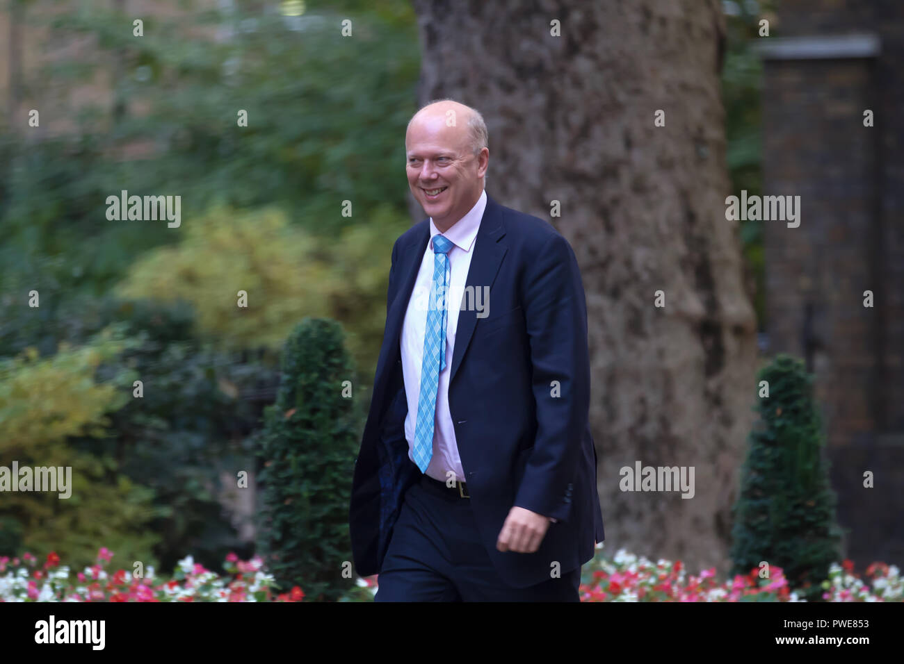 London,UK,16th October 2018,Secretary of State for Transport The Rt Hon Chris Grayling MP arrives for the Cabinet meeting in 10 Downing Street, ahead of a crunch Brussels Summit tomorrow. Theresa May will deliver an appeal to break deadlock at the summit. Top ministers met late last night In Andrea Leadsom’s office while eating Pizza to discuss details further.Credit: Keith Larby/Alamy Live News' Stock Photo