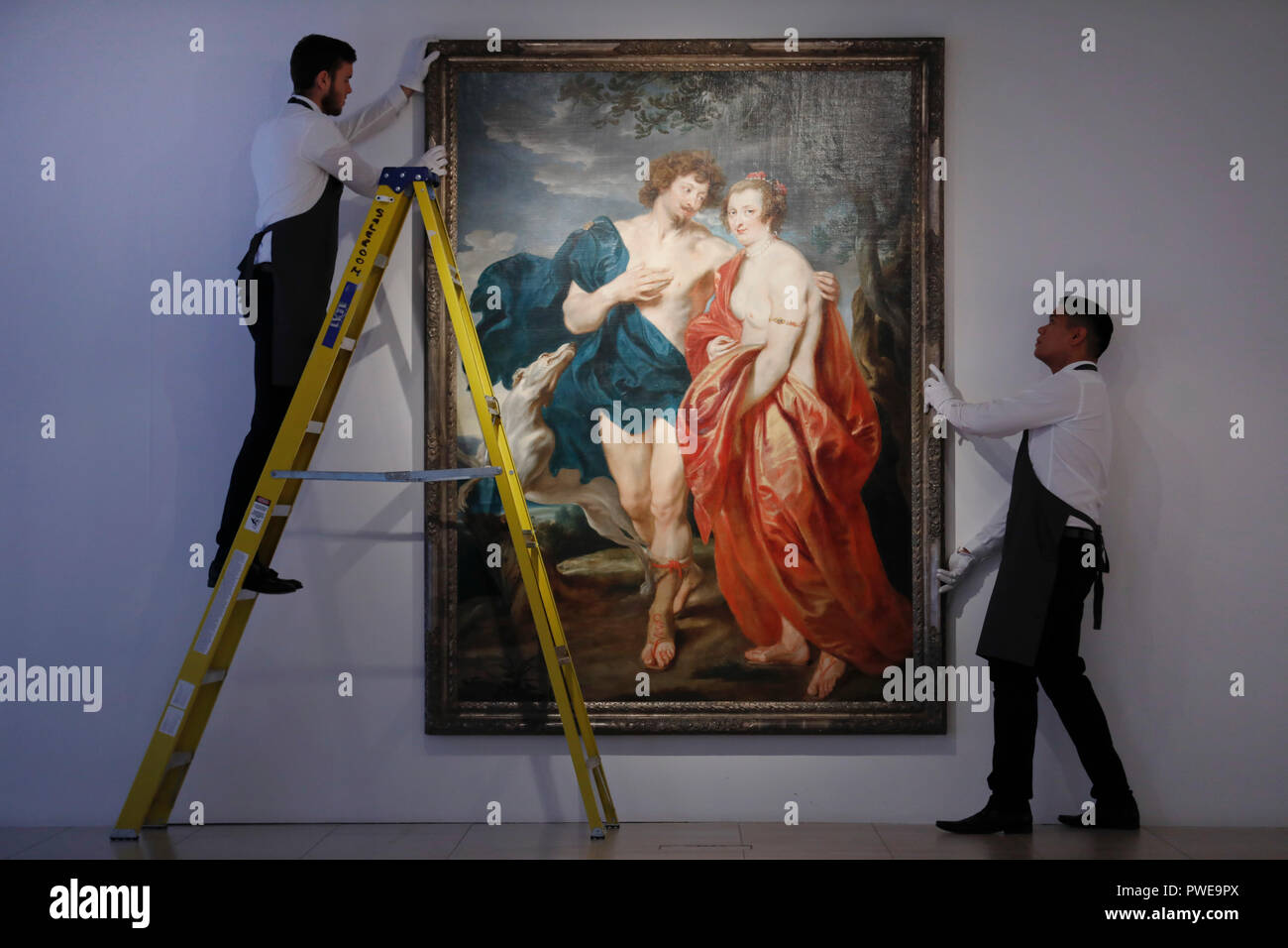 London, UK, 16th Oct 2018. Christie's art handlers adjust Dutch master Anthony Van Dyck 'swork 'Venus and Adonis' at Christie's AuctionHouse in London, UK, Tuesday October 16, 2017. The piece is expected to achieve up to £3.5million when is comes to auction as part of the Albada Jelgersma Collection sale during Christie's Classic Week in December. Photograph : Credit: Luke MacGregor/Alamy Live News Stock Photo