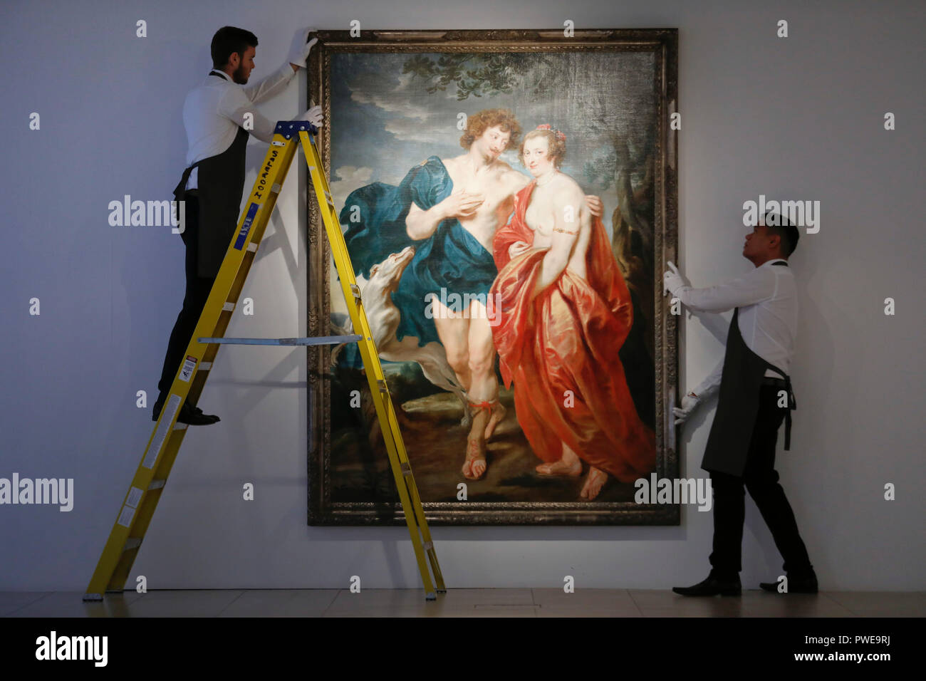 London, UK, 16th Oct 2018. Christie's art handler adjust Dutch master Anthony Van Dyck 's work 'Venus and Adonis' at Christie's AuctionHouse in London, UK, Tuesday October 16, 2017. The piece is expected to achieve up to £3.5million when is comes to auction as part of the Albada Jelgersma Collection sale during Christie's Classic Week in December. Photograph : Credit: Luke MacGregor/Alamy Live News Stock Photo