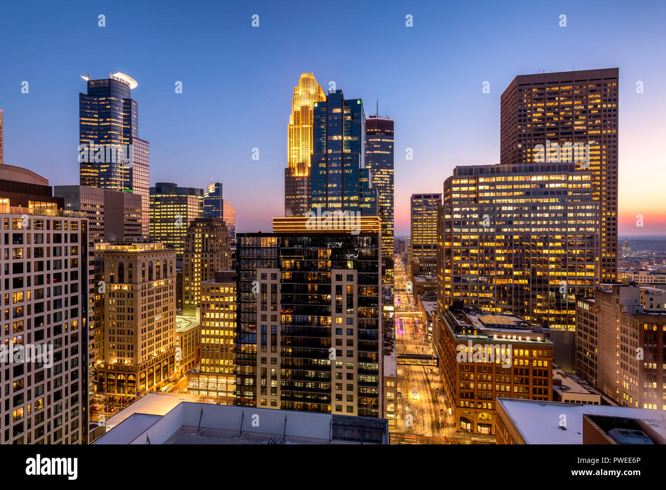 Minneapolis, Minnesota skyline at dusk as seen from the 30th floor of the 365 Nicollet apartment tower. Stock Photo
