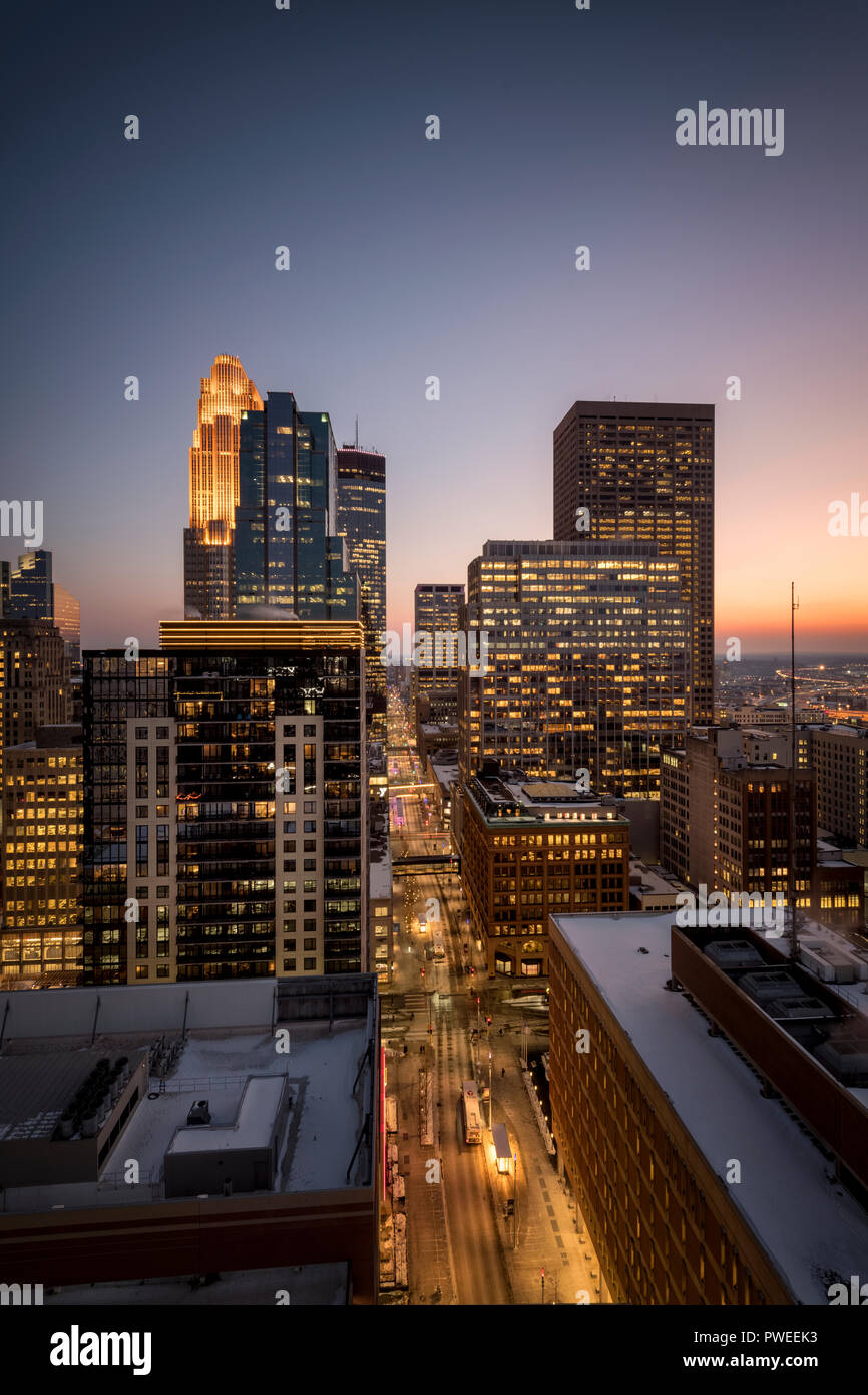 Minneapolis, Minnesota skyline at sunset as seen from the 26th floor of the 365 Nicollet apartment tower. Stock Photo