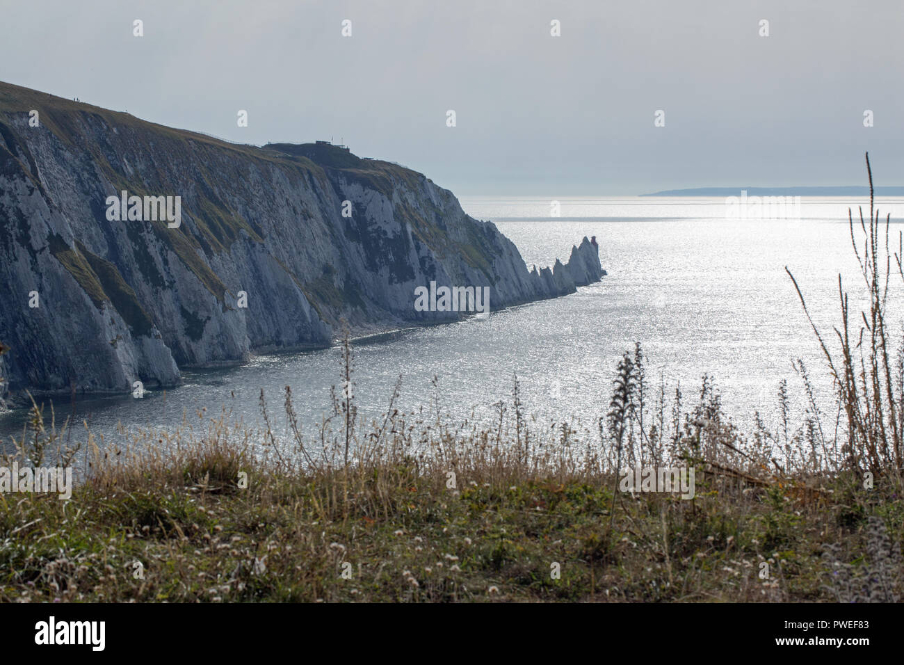 The Needles. Alum Bay. The Isle of Wight. Lighthouse. Landmark Attraction. Three chalk stacks. Western extremity. Totland. I.O.W., South coast, England. Stock Photo