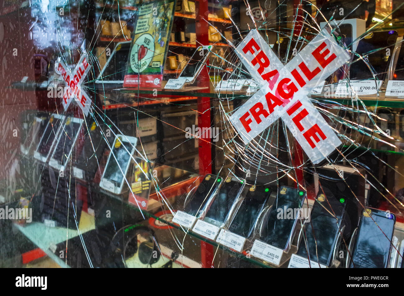 Attempted Smash and Grab break in at a CEX store in Cambridge UK Stock Photo