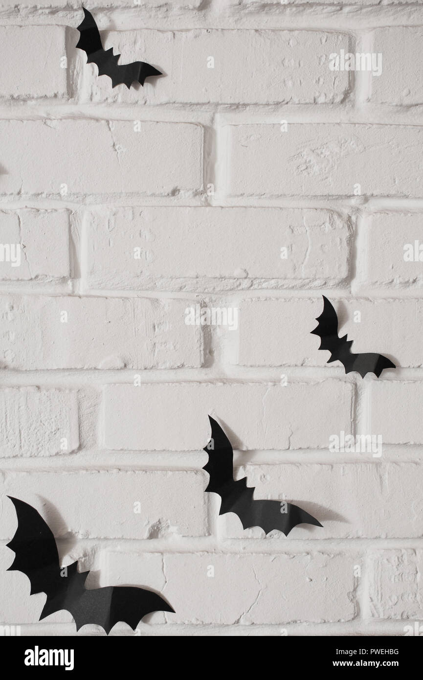 Scissors and paper bat on light background, top view Stock Photo