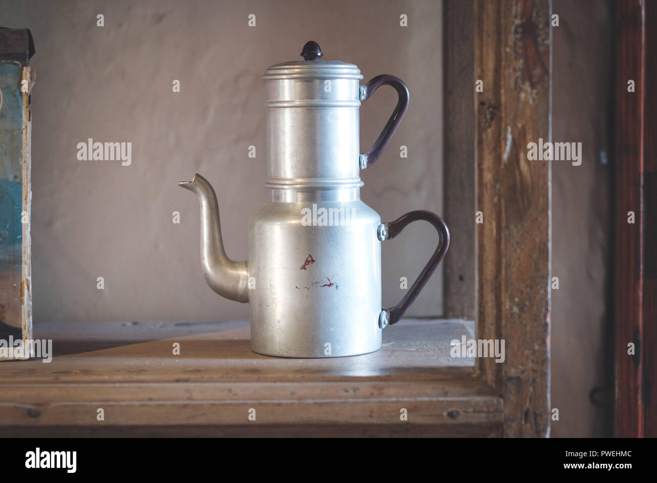 double tea kettle pot vintage old kitchenware Stock Photo