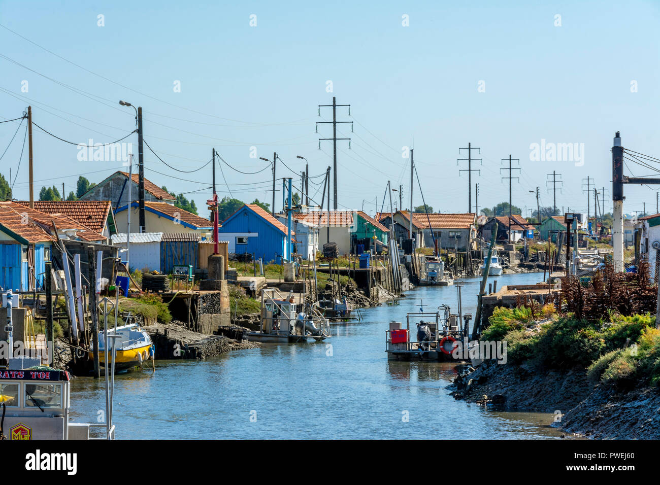 Colourful cabins oyster farmers,  Oleron island, Charente Maritime, Nouvelle-Aquitaine, France Stock Photo