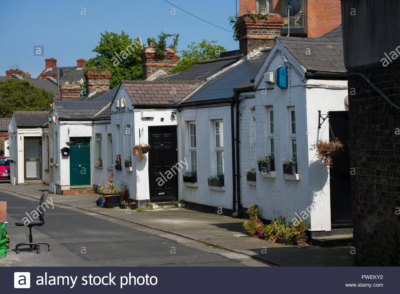Small Cottages In The Historic Working Class Neighborhood Of The