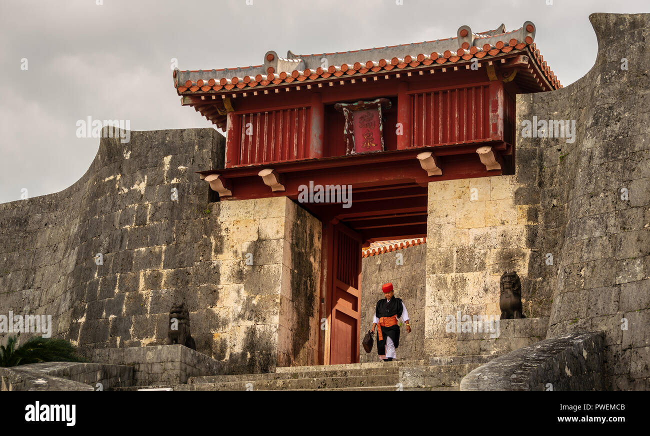Man Leaving Shuri Castle, Okinawa, Japan Stock Photo