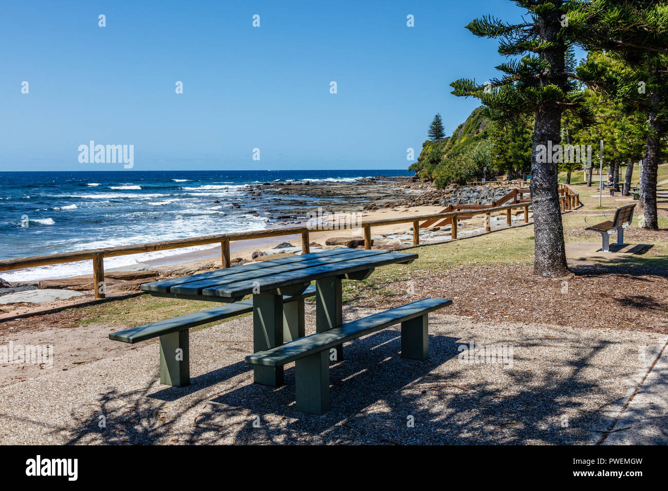 Public park wooden bench near the ocean at Moffat Beach, Sunshine Coast,  Queensland, Australia Stock Photo - Alamy