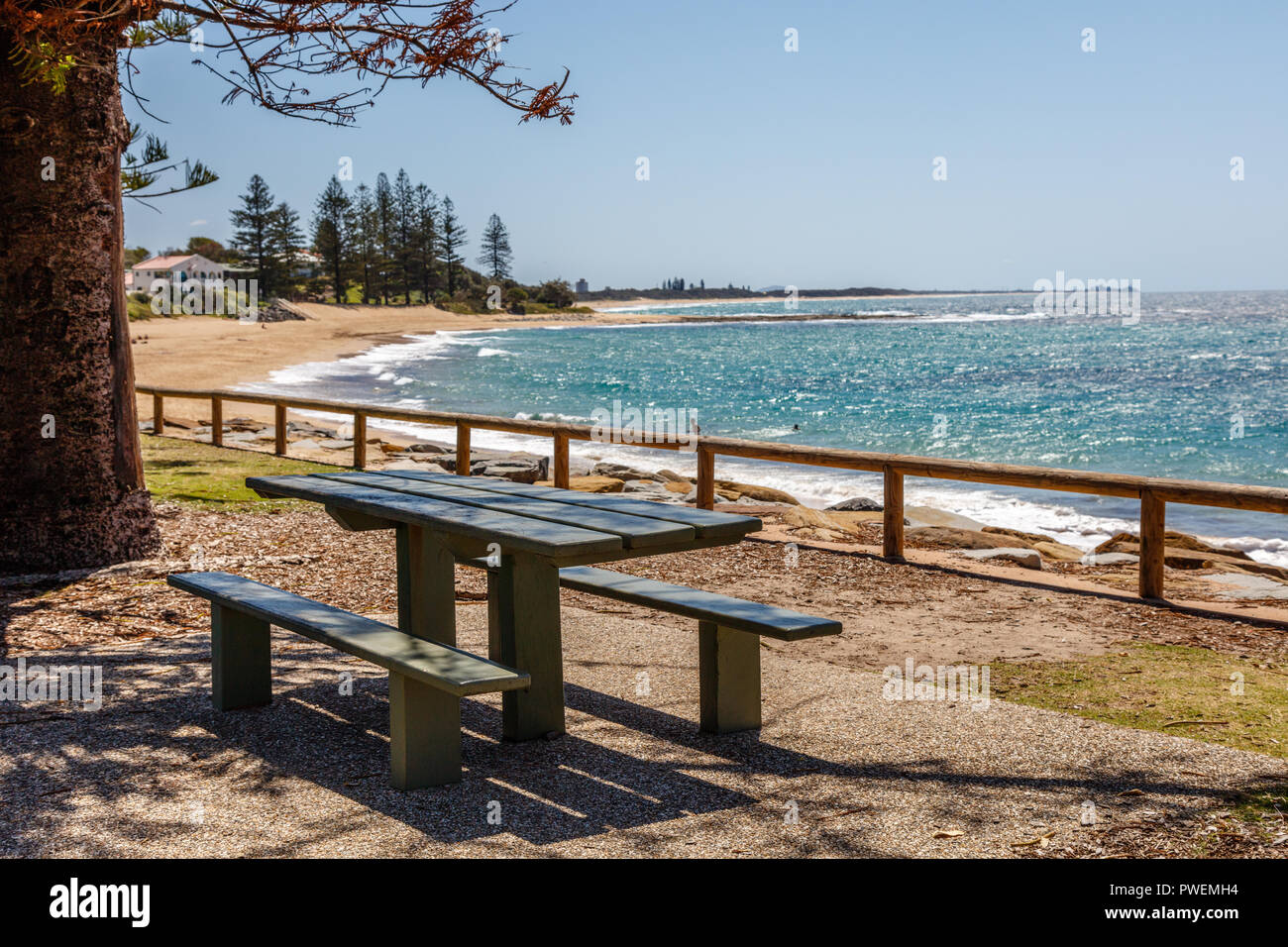 Public park wooden bench near the ocean at Moffat Beach, Sunshine Coast,  Queensland, Australia Stock Photo - Alamy