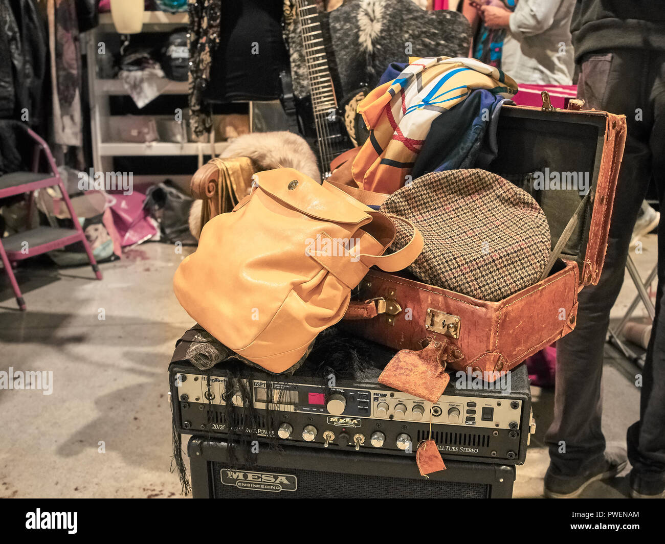 Milan, Italy - October 14, 2018: Shot of a vintage luggage on an amplifier. The East Market is a vintage indoor market led once per month in Milan. Stock Photo