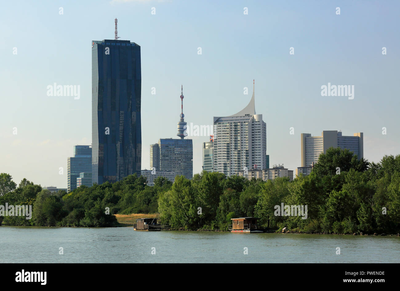 Austria, A-Vienna, Danube, Federal Capital, skyline of the Donau City, f.l.t.r. Ares Tower, Commercial Tower, DC Tower 1, Commercial Tower, skyscraper, Mischek Tower, apartment tower, Donau Tower, highrise Neue Donau, apartment tower, UNO City with VIC Vienna International Centre and Austria Center Vienna, river landscape, Danube landscape, Danube promenade, Danube bank Stock Photo