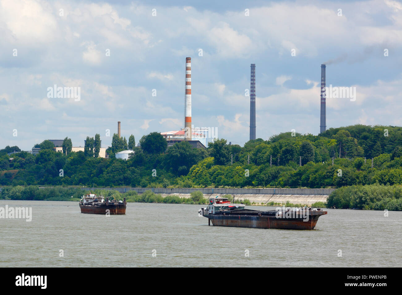 Bulgaria, Northern Bulgaria, Ruse at the Danube, Rousse, Russe, Danube lowlands, industrial landscape, chimney stacks, freighters on the Danube, Danube landscape, river landscape, Danube navigation Stock Photo