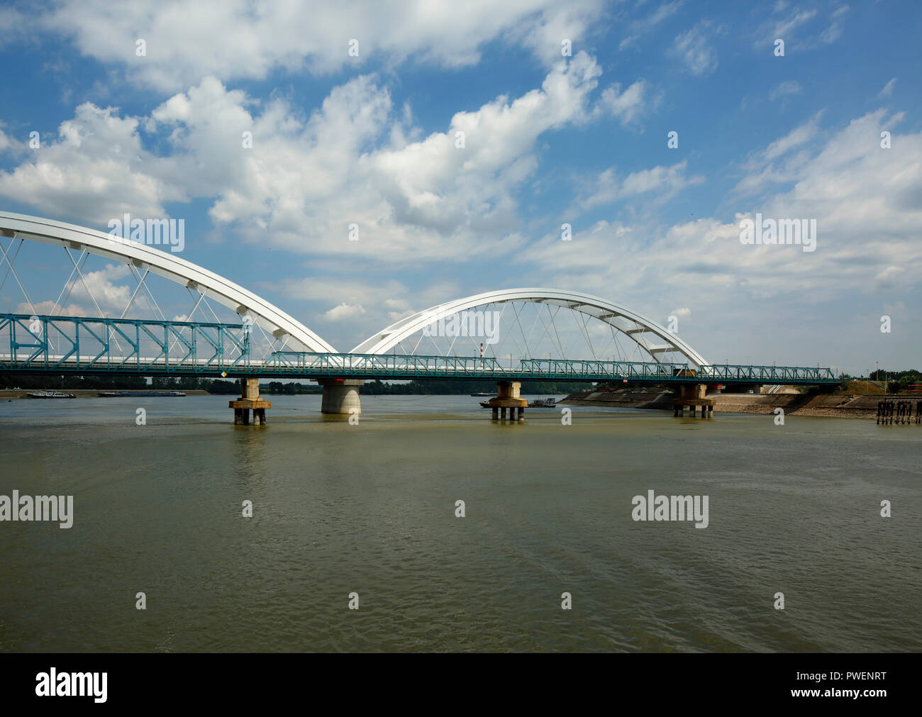 Serbia, Novi Sad on the Danube, Province Vojvodina, District South Backa, Danube bridges, road bridges and railway bridges, behind the Zezelj Bridge, Zezeljev Most, ahead the Road-Railway Bridge, Bosko Perosevic Bridge, Most Boska Perosevica, European Capital of Culture 2021 Stock Photo