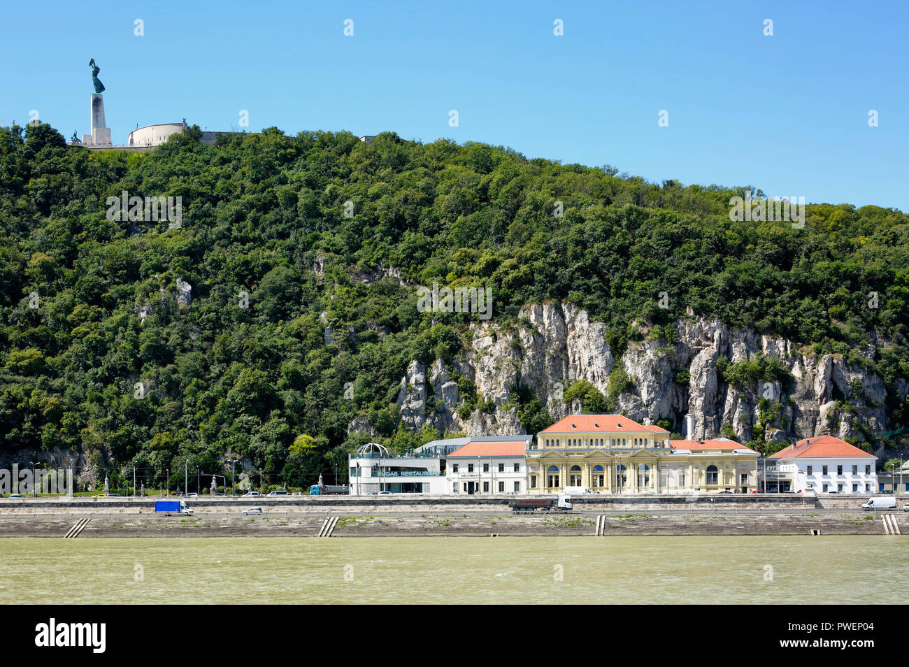 Hungary, Central Hungary, Budapest, Danube, Capital City, Gellert Hill with Liberty Monument in Buda, Liberty Statue by Zsigmond Kisfaludi Strobl, at the foot ot the mountain the Rudas Bath, Thermal bath and swimming baths, tourism, UNESCO World Heritage Site Stock Photo