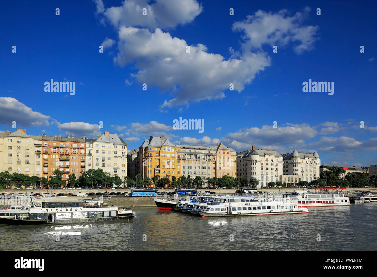 Hungary, Central Hungary, Budapest, Danube, Capital City, Danube bank of Pest, Danube landscape, business houses and residential buildings, shipping pier, ships, river navigation, UNESCO World Heritage Site Stock Photo