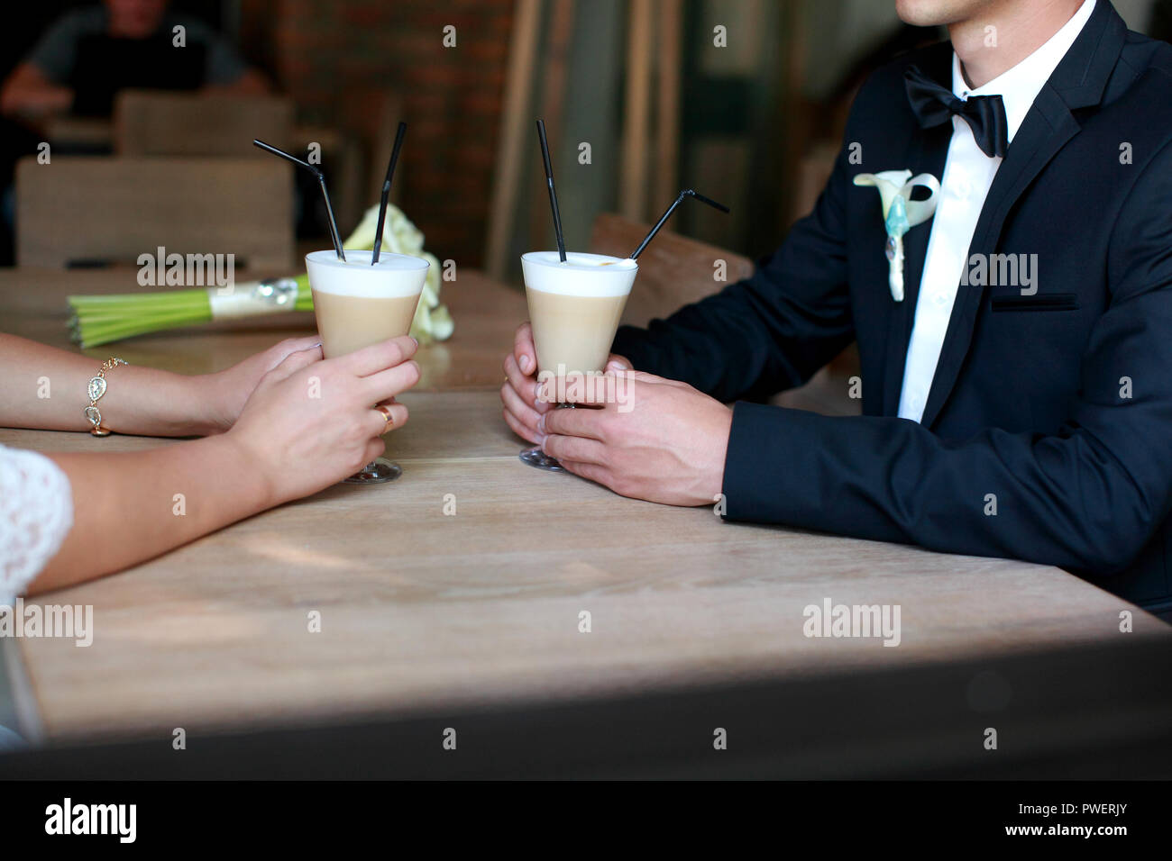 Coffee time, coffee break. Wedding day. Couple in cafe Stock Photo