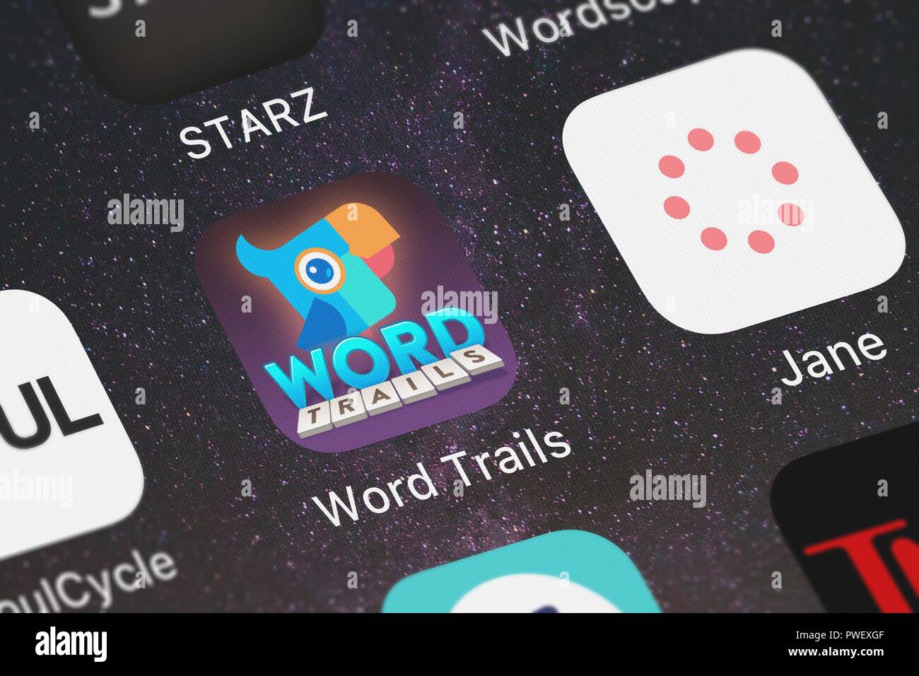 London, United Kingdom - October 15, 2018: Screenshot of the Word Trails mobile app from brainbow icon on an iPhone. Stock Photo