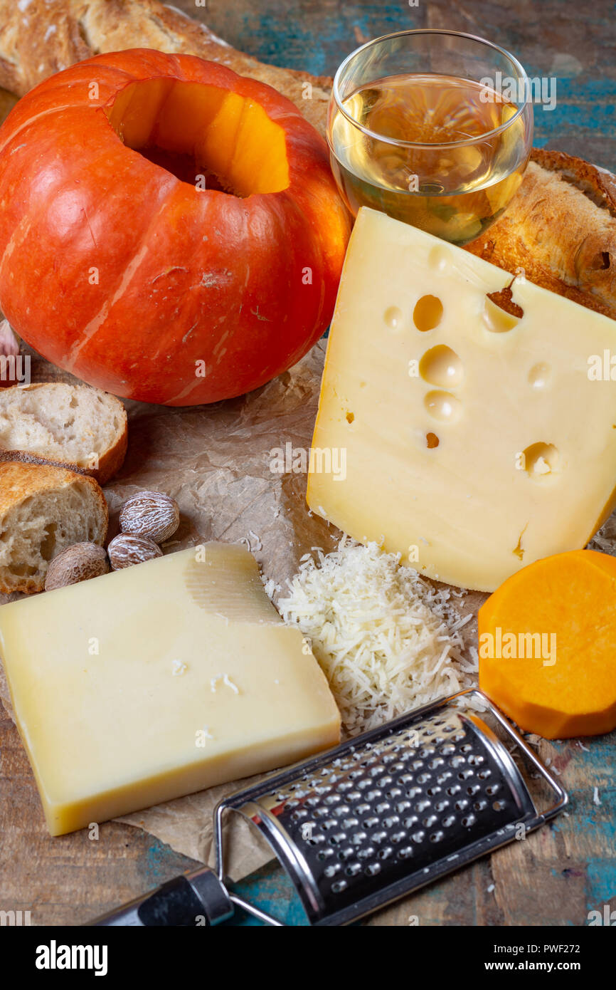 Ingrediens for traditional seasonal Swiss dish, pumpkin fondue with