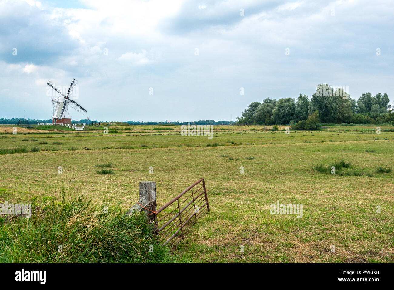 Groningen, Netherlands, August 15, 2018: The White mill (Witte molen) at Groningen, a typical Dutch historic mill in the north of The Netherlands Stock Photo