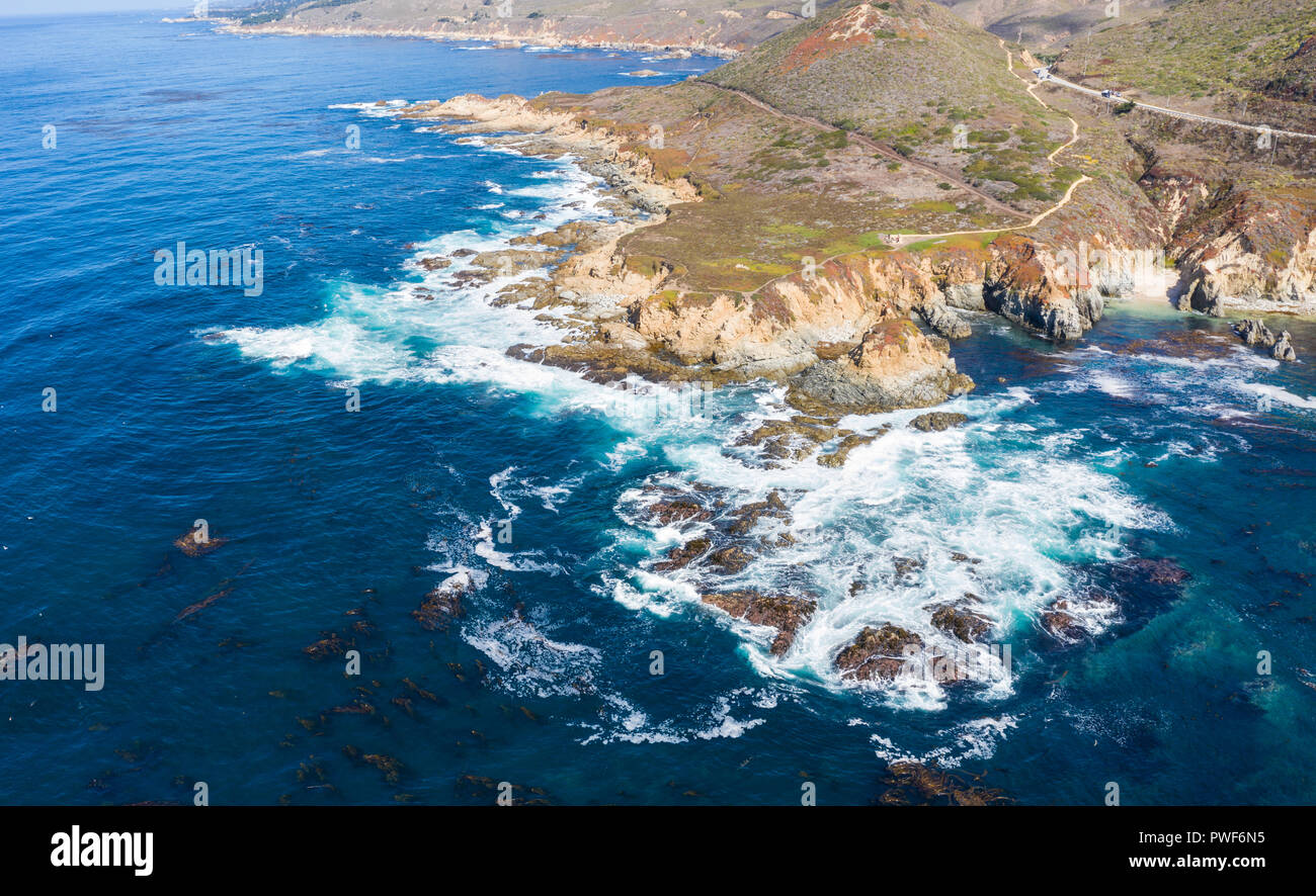 The cold, nutrient-rich waters of the North Pacific Ocean wash against the rocky and scenic coastline of Northern California not far from Monterey. Stock Photo