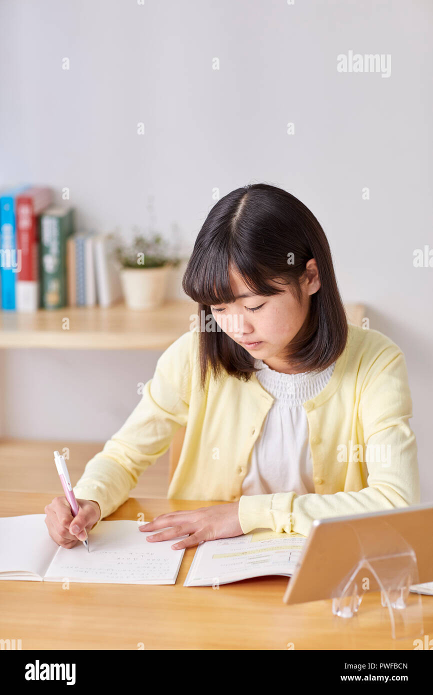Japanese Kid Studying At Home Stock Photo 222229077 Alamy