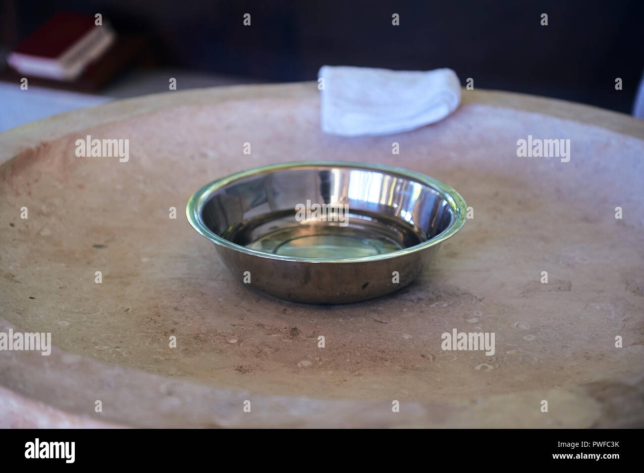 Detail of baptismal font at catholic church Stock Photo